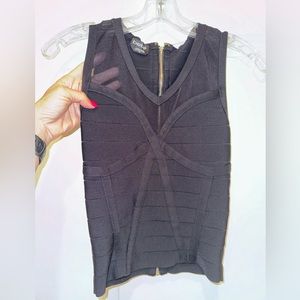 Beautiful and sexy BEBE top. Size PS.